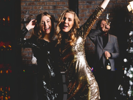 At a party, you…