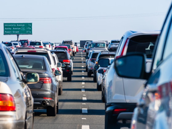 You are stuck in bumper-to-bumper traffic. You: