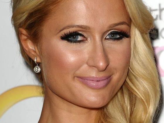 True or false: Paris Hilton is not a blue-eyed, blonde-haired bombshell. She naturally has dark hair and brown eyes.