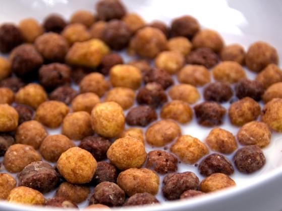 Which cereal has the most sugar? Reese's Puffs or Golden Grahams?